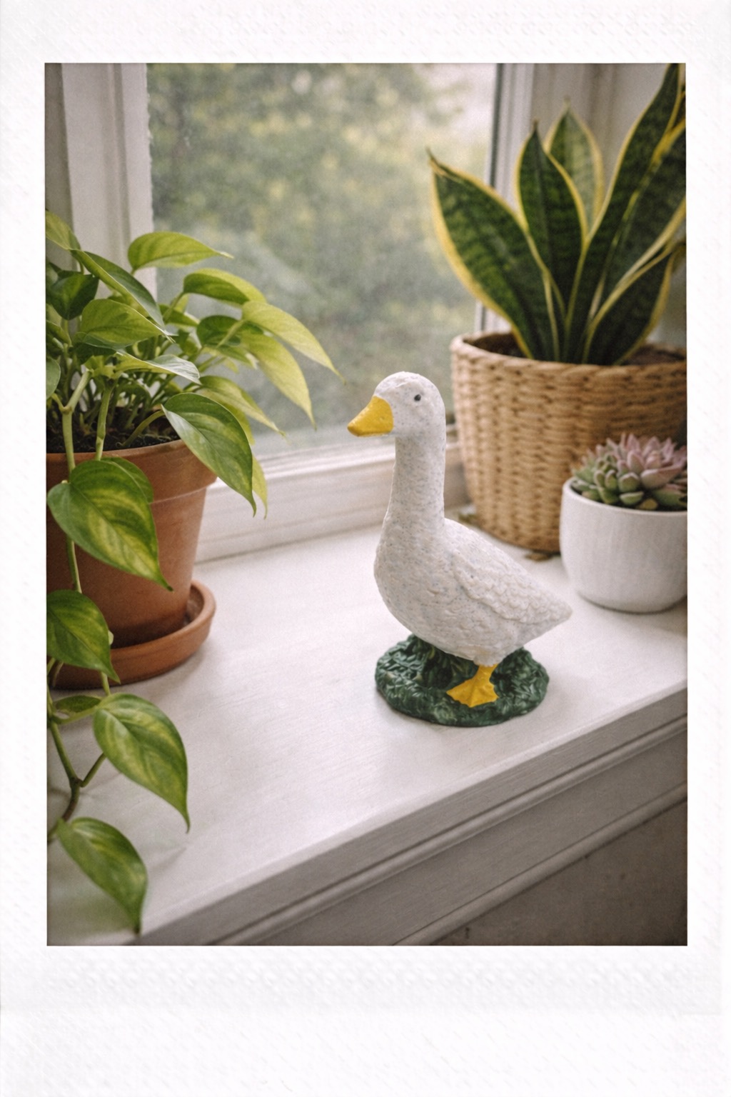 Mini Porch Goose on a windowsill